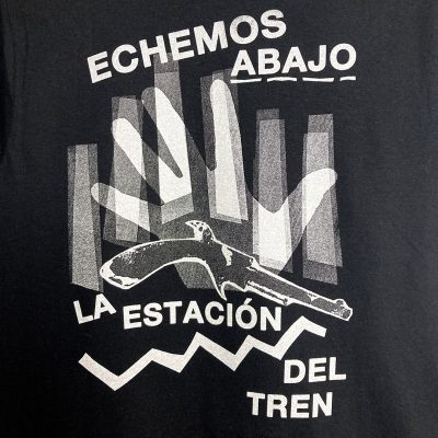 Front view of the tearjerker silkscreen DIY t-shirt featuring Los Saicos classic "Demolición" lyrics.