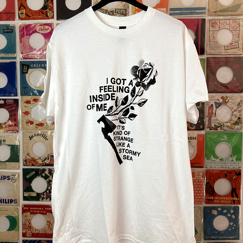 Front view of the tearjerker screen printed DIY t-shirt featuring ""New Rose"", the British 1976 punk single from chaos-progenitors The Damned